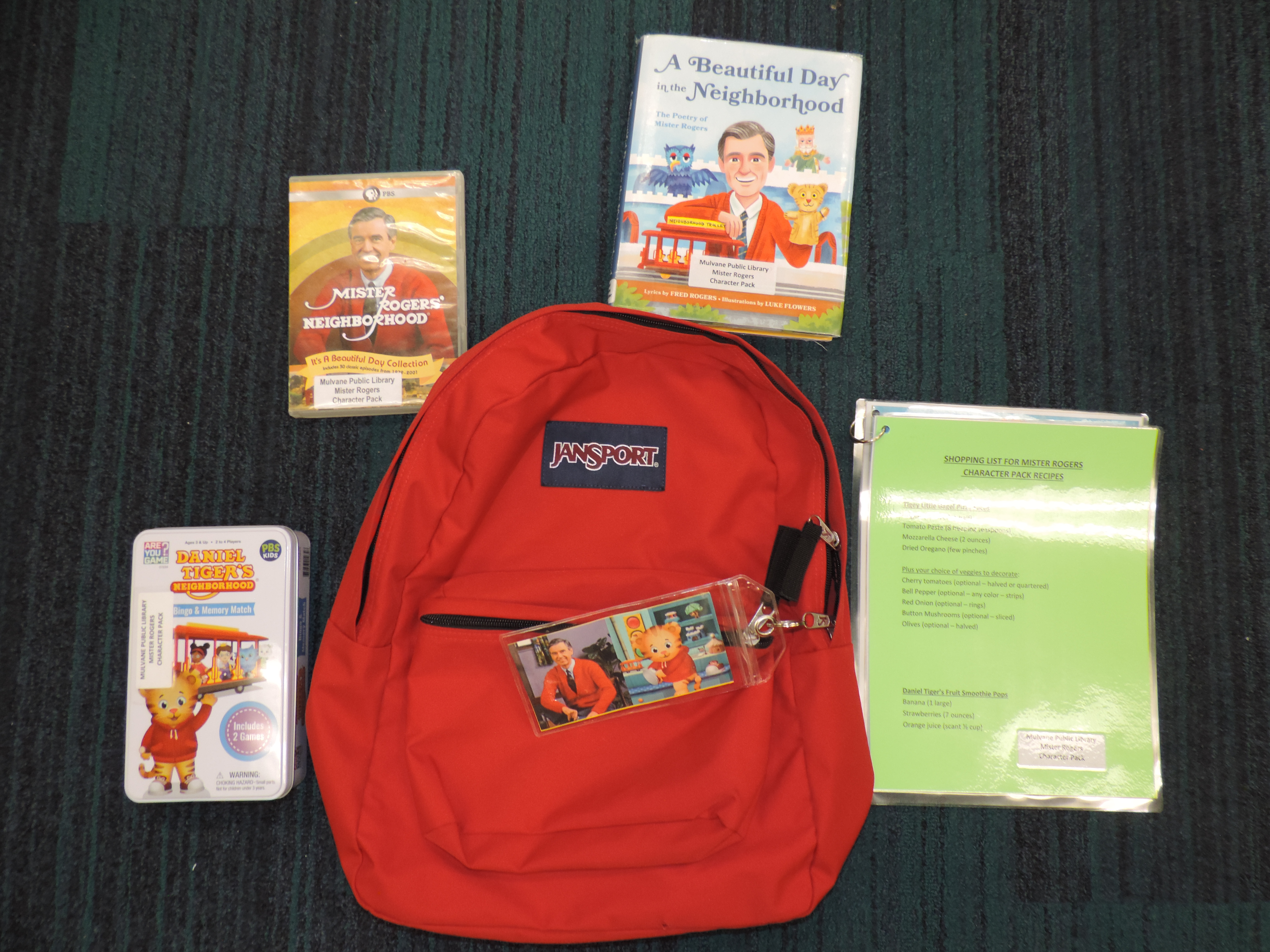 Red backpack with books and activities