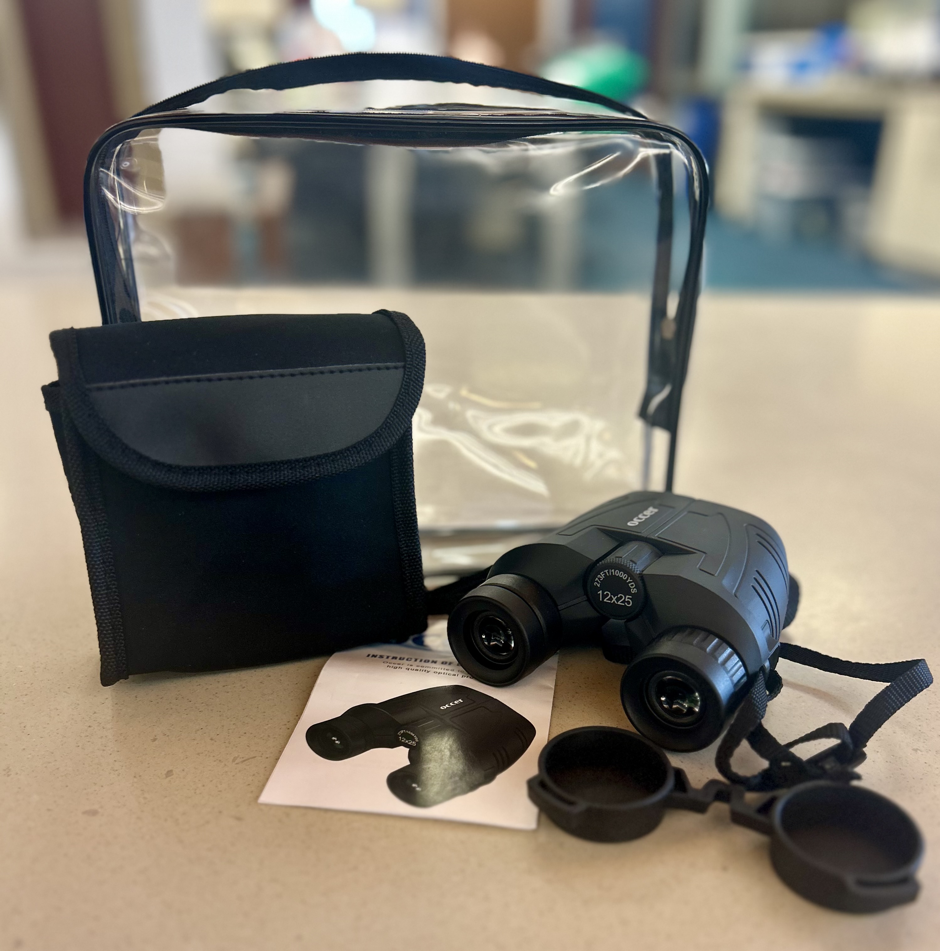 Binoculars, guide, and carrying case