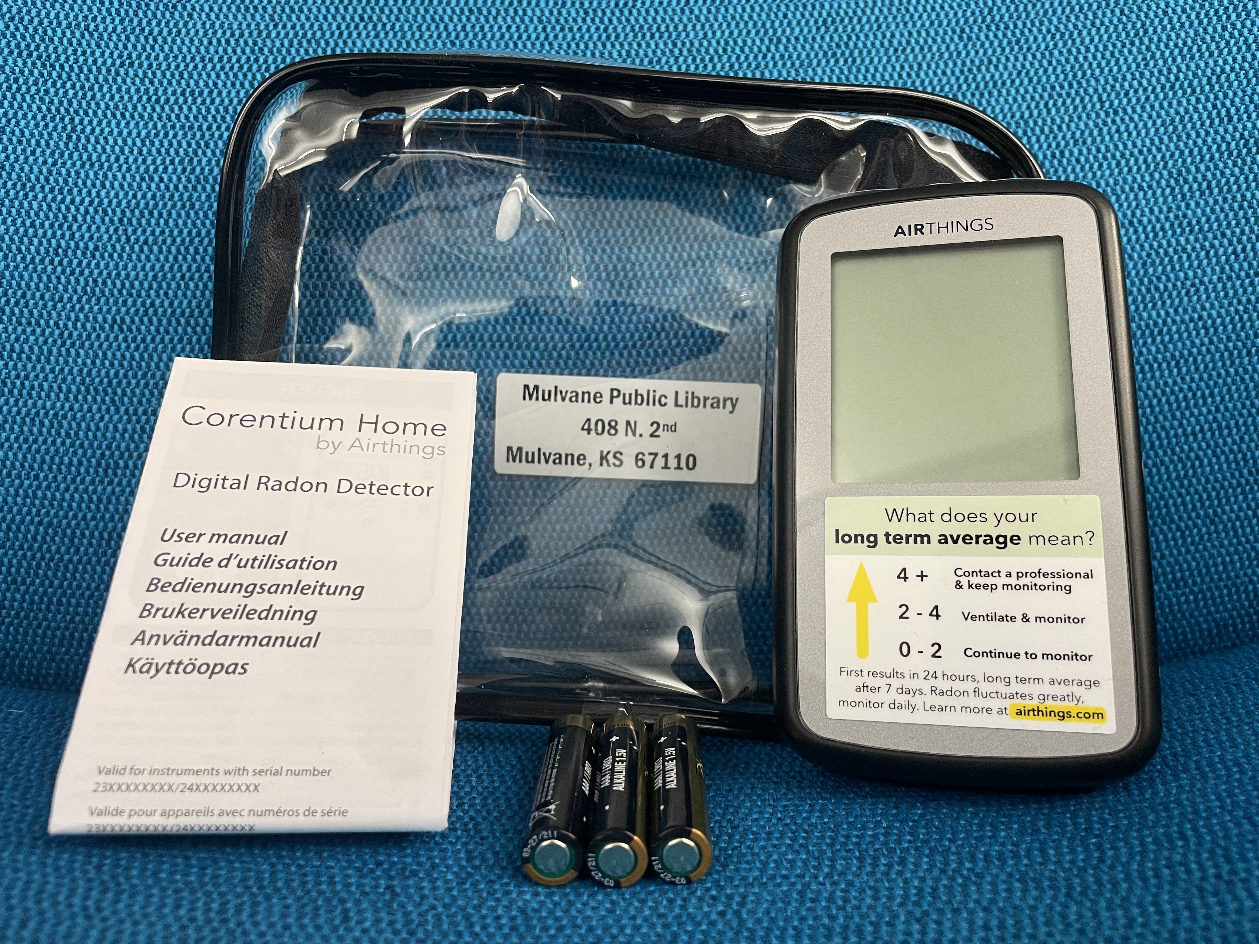 Radon detection device, clear carrying case, batteries, and user manual
