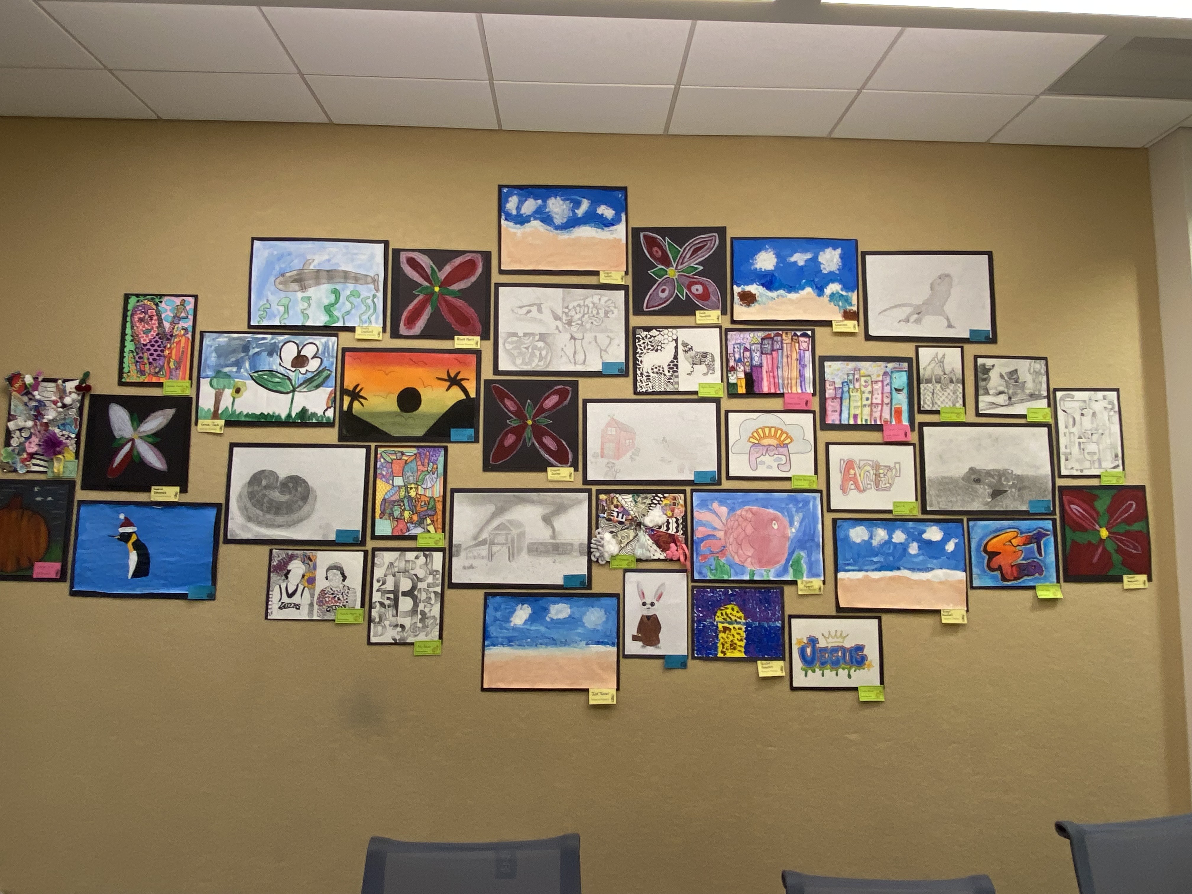 variety of art on beige wall