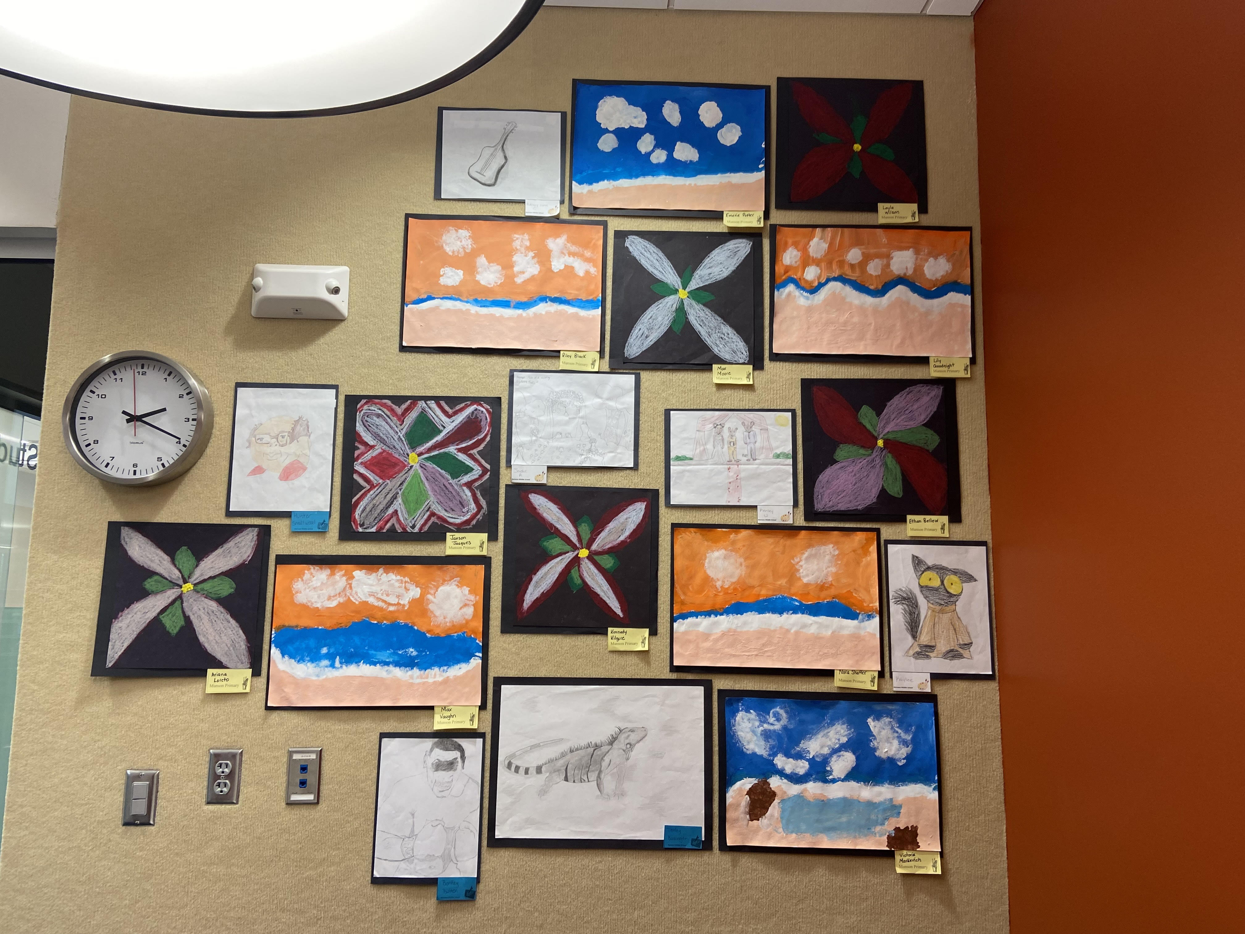 variety of art on beige wall