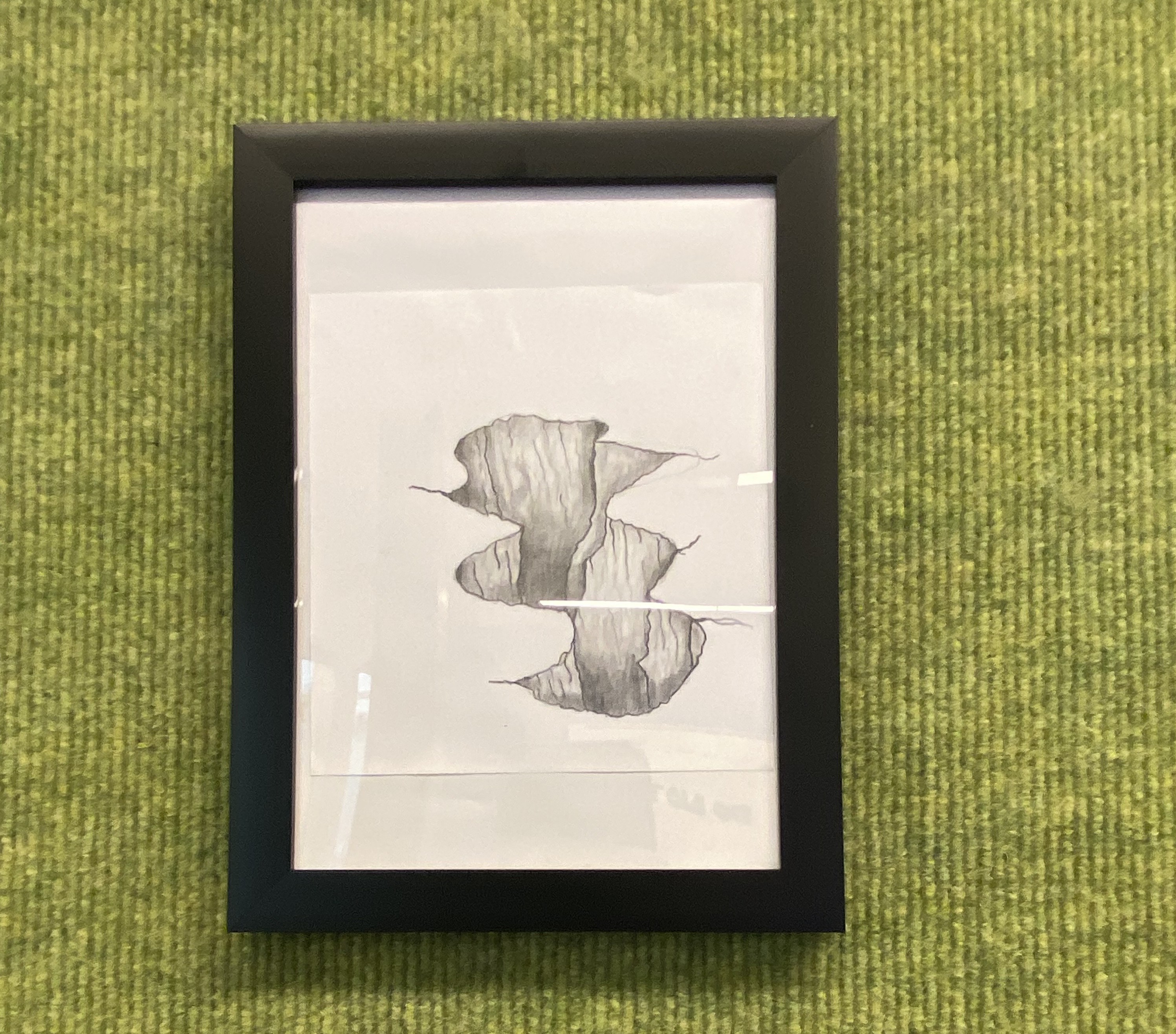 framed drawing of crater