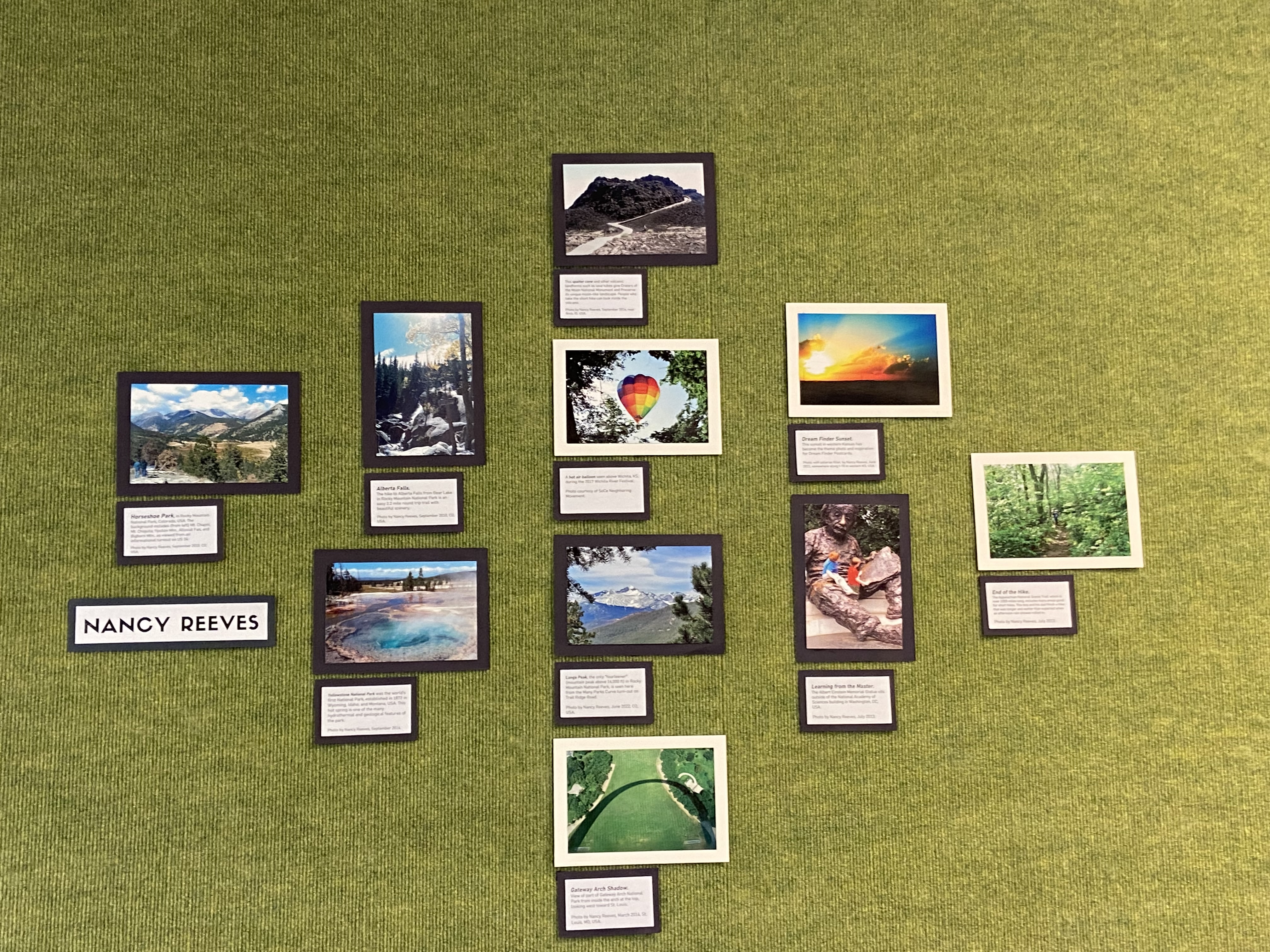 postcards on green textured wall