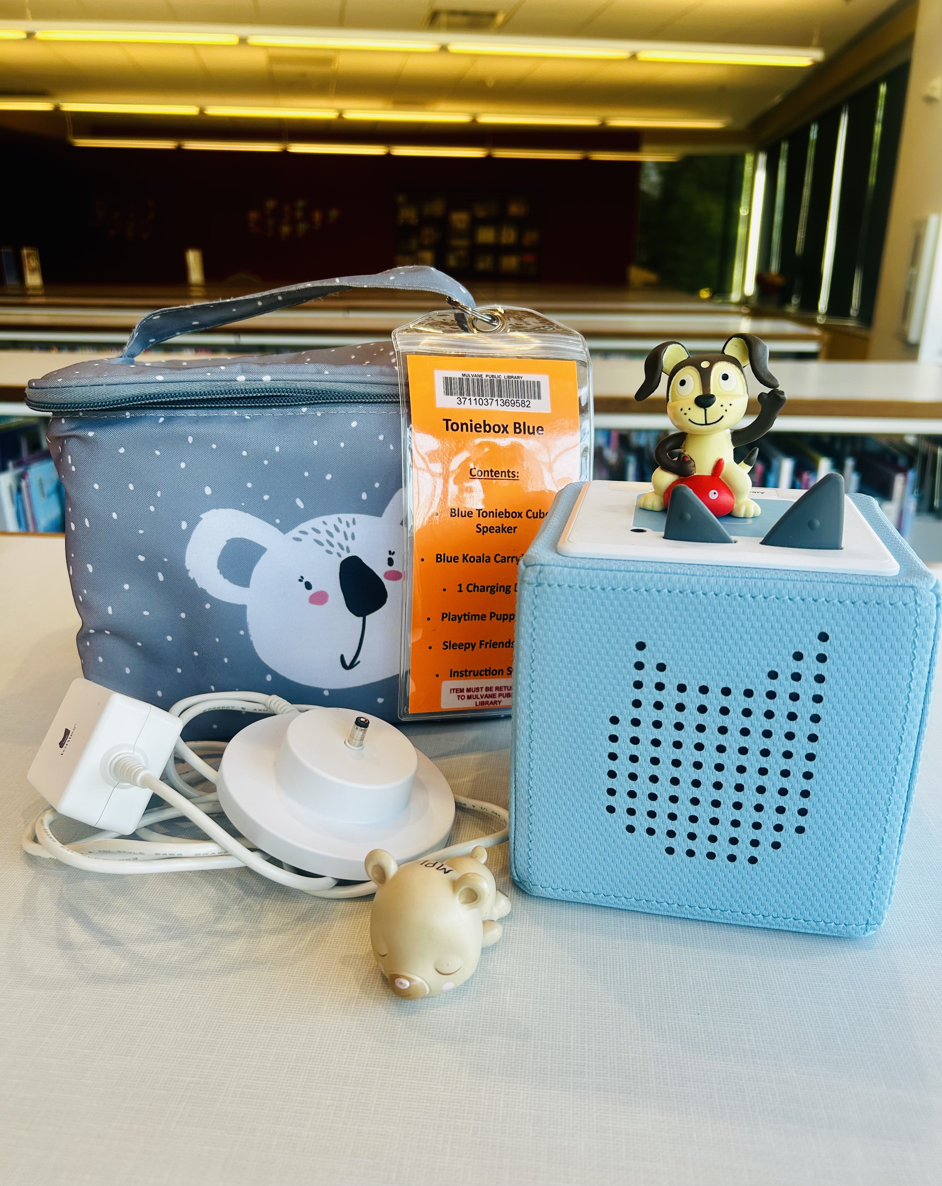 Toniebox blue with carrying case and Playtime Puppy and Bedtime stories figurines